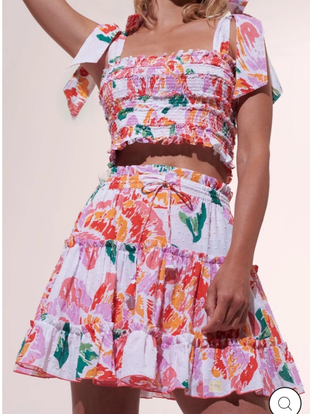 Poupette St. Barth Tiered Mini Skirt and crop top set in Pink, Orange Floral